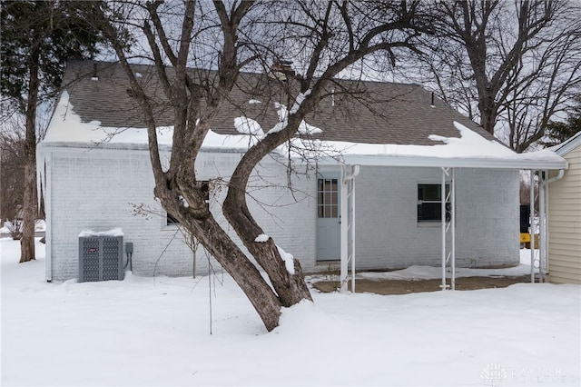 view of snow covered property