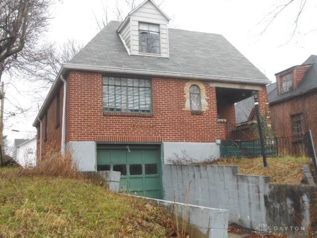 exterior space with a garage