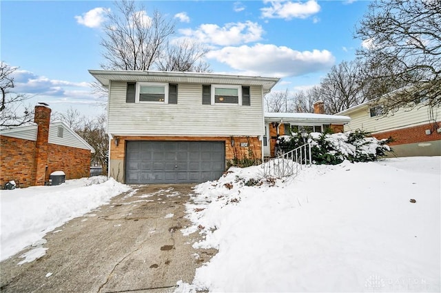 split level home with a garage