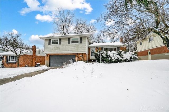 split level home with a garage