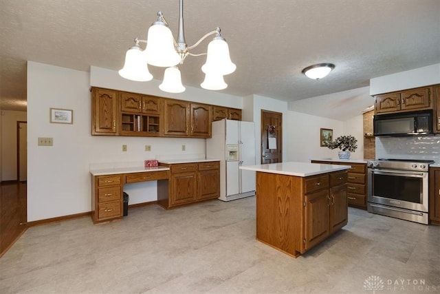 kitchen with decorative light fixtures, a kitchen island, electric range, a notable chandelier, and white fridge with ice dispenser