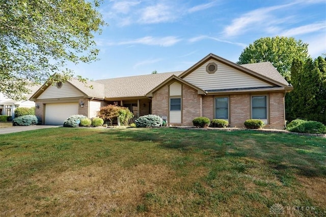 single story home featuring a front lawn and a garage