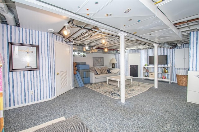 basement featuring carpet flooring