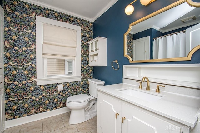 bathroom featuring crown molding, vanity, and toilet