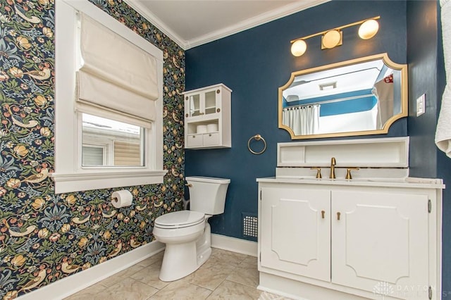 bathroom featuring crown molding, vanity, and toilet