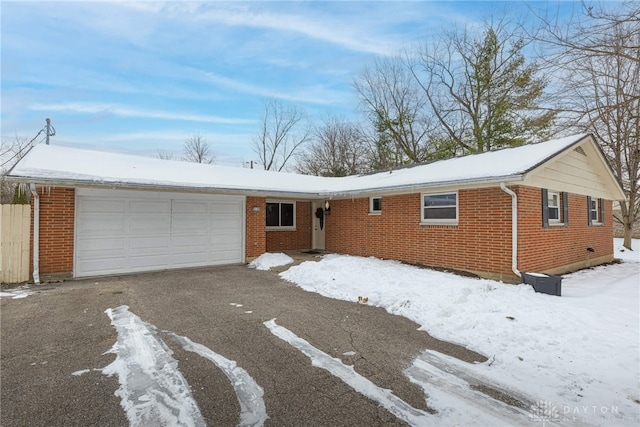 single story home with a garage