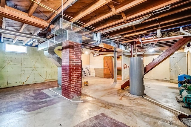 basement featuring electric water heater