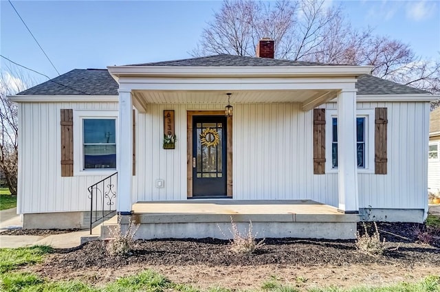 property entrance featuring covered porch