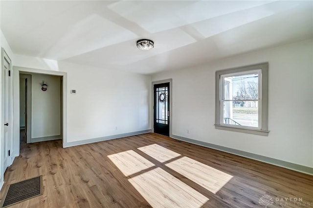 unfurnished room with light hardwood / wood-style floors