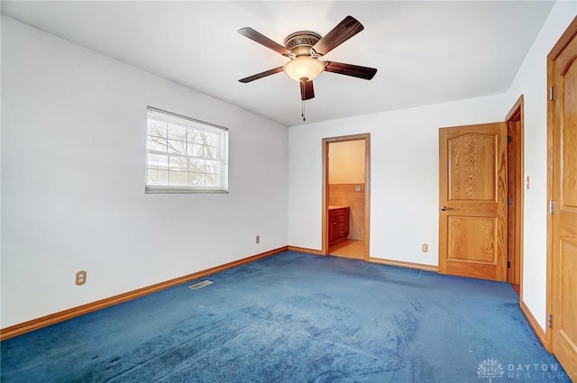 unfurnished bedroom with ceiling fan, connected bathroom, and carpet floors