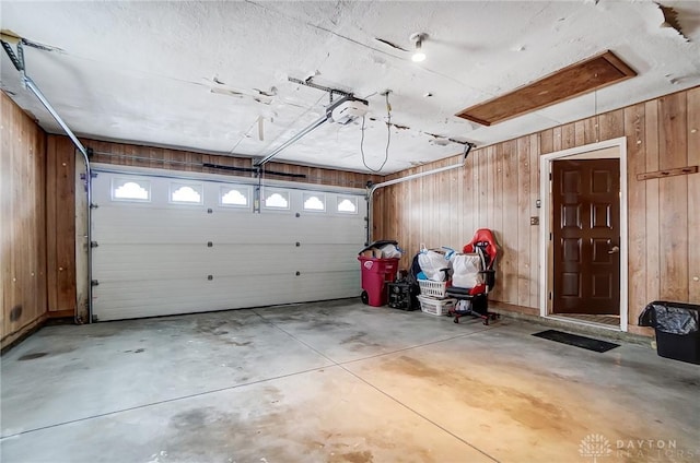 garage with wood walls