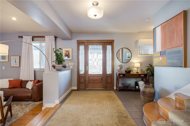 foyer with light hardwood / wood-style flooring