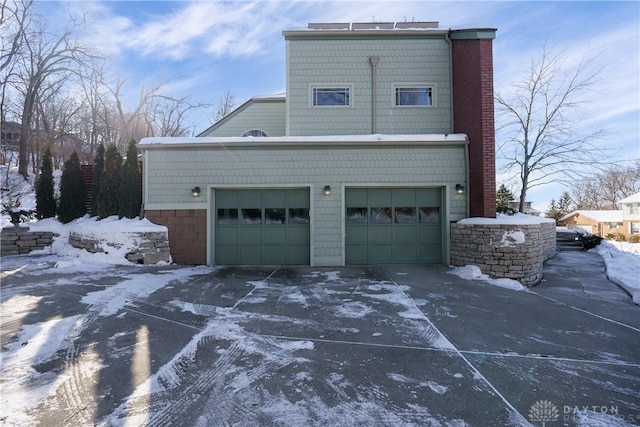 exterior space featuring a garage