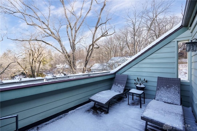 view of snow covered patio