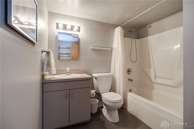 full bathroom with toilet, tile patterned floors, shower / bath combination with curtain, and vanity