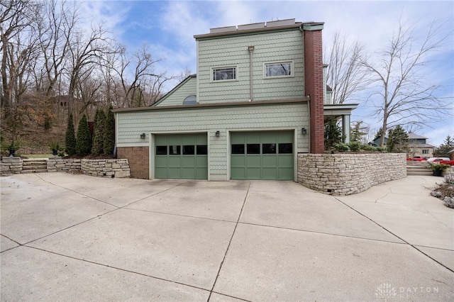 view of home's exterior with a garage