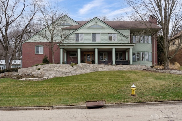 view of front of home featuring a front yard