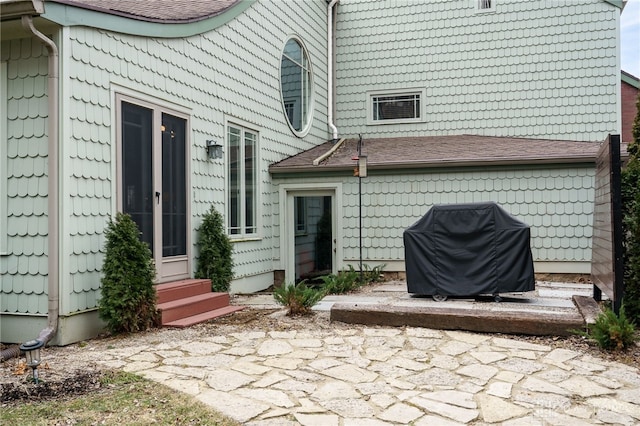 rear view of house with a patio