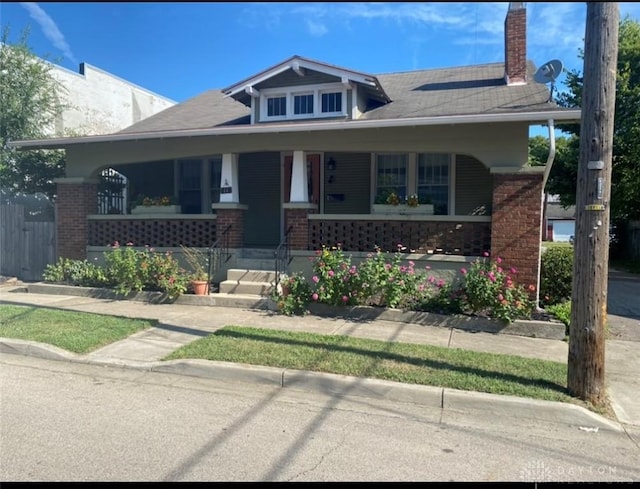 view of front of home featuring covered porch