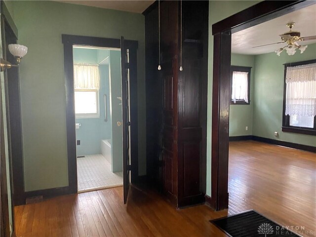 hallway featuring hardwood / wood-style flooring