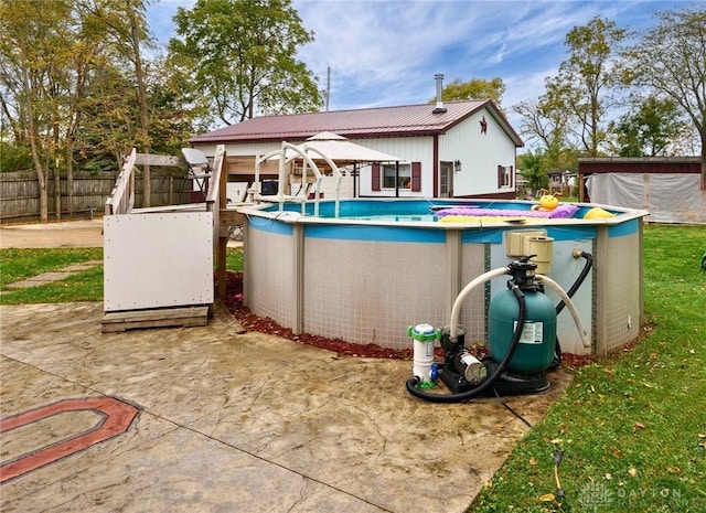 exterior space featuring a fenced in pool