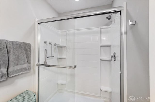 bathroom with an enclosed shower