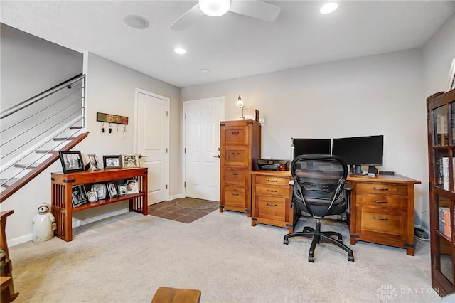 home office with ceiling fan and carpet flooring