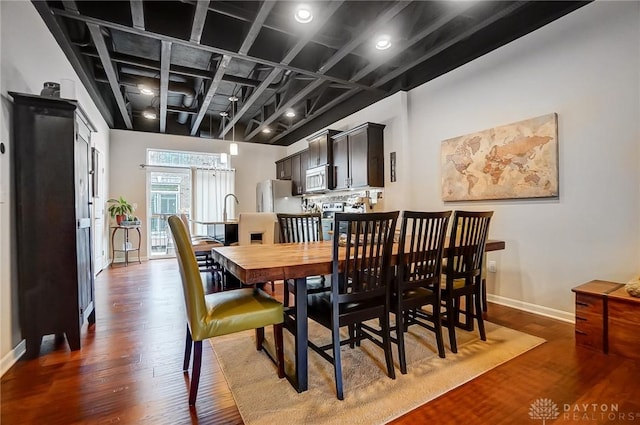 dining room featuring dark hardwood / wood-style floors