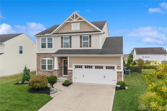 craftsman-style house with a front yard and a garage