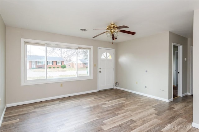 entryway featuring ceiling fan and light hardwood / wood-style floors