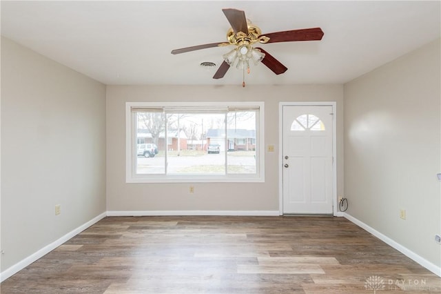 foyer with ceiling fan and hardwood / wood-style floors