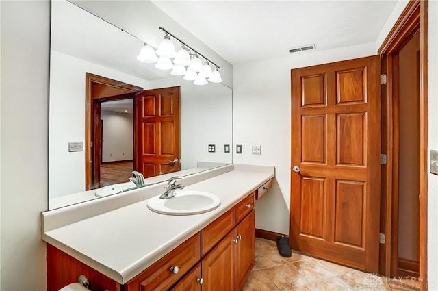 bathroom featuring vanity and tile patterned flooring