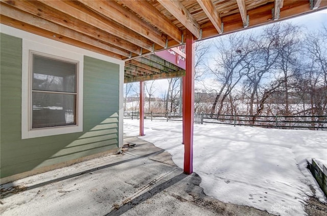 view of snow covered patio