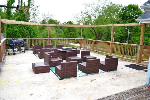 4403 Clayton Rd, Perry Twp, OH 45309 - wooden terrace with an outdoor living space with a fire pit, grilling area, and a patio