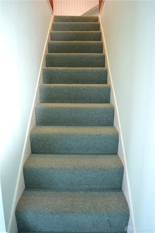 4403 Clayton Rd, Perry Twp, OH 45309 - stairs with carpet flooring