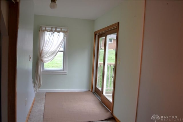 4403 Clayton Rd, Perry Twp, OH 45309 - unfurnished room featuring light colored carpet and baseboards
