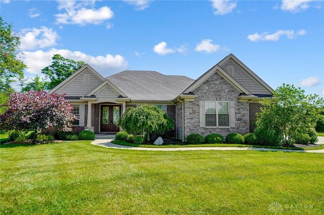 craftsman-style home with a front yard