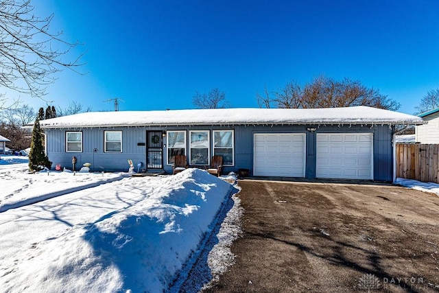 single story home with a garage