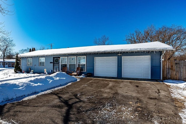 single story home with a garage