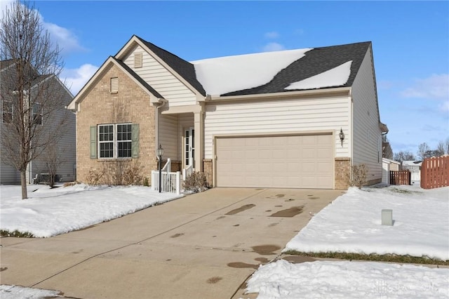 view of front of property featuring a garage