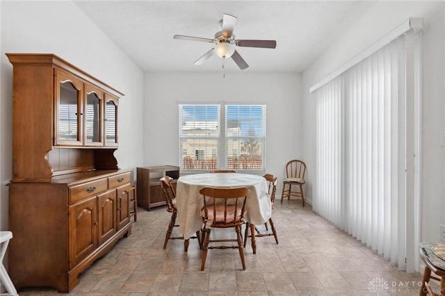 dining room featuring ceiling fan