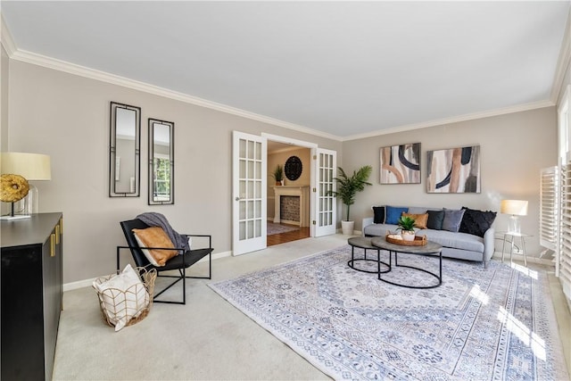 living room with carpet floors, french doors, and crown molding