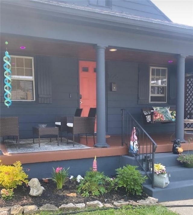 property entrance featuring covered porch