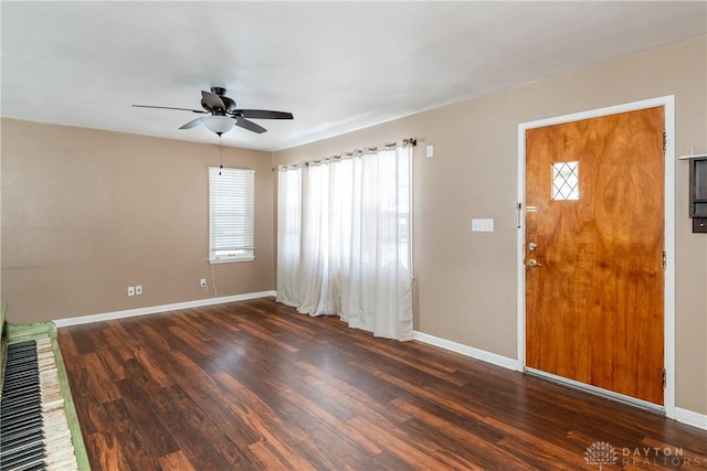 entrance foyer featuring ceiling fan and dark wood-type flooring