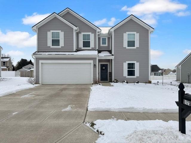 view of property featuring a garage