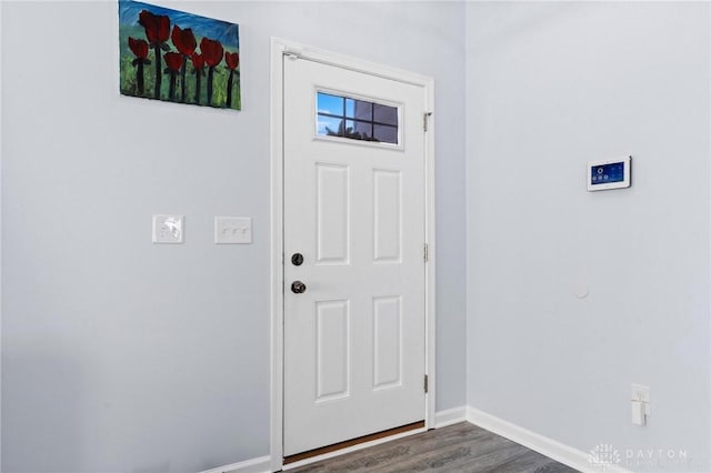 entrance foyer featuring dark hardwood / wood-style flooring