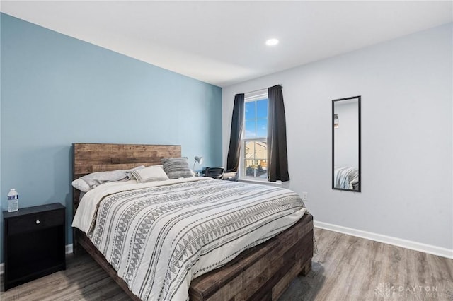 bedroom featuring wood-type flooring