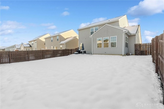 view of snow covered property