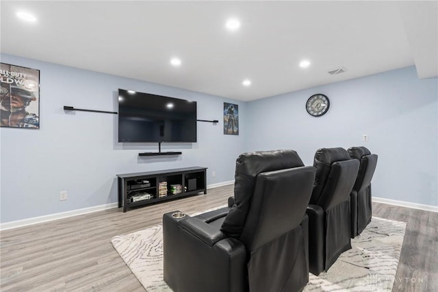 home theater featuring light hardwood / wood-style floors