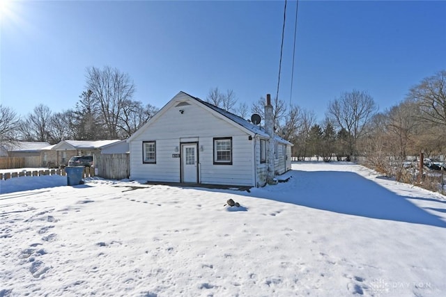 view of snow covered property